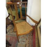 Pair of Arts and Crafts mahogany and inlaid open elbow chairs
