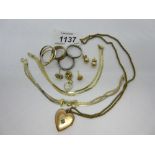 19th Century gilt metal and turquoise set heart shaped locket and chain, a 9ct gold wedding band,