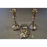 Pair of silver candlesticks, set of twelve silver coffee spoons, a silver dish,