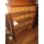 Early 20th Century oak four shelf open bookcase on bracket feet