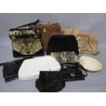 Box containing a quantity of various handbags, evening purses etc.