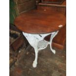 Circular white painted cast iron two tier pub table of Britannia design with an oak top