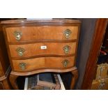1930's Walnut serpentine fronted three drawer bedside chest