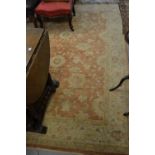 Afghan Ziegler rug of all-over floral design with multiple borders on a rust ground,