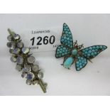 Moonstone set bar brooch together with a turquoise set butterfly brooch (at fault)