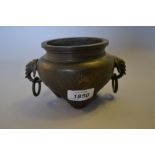 Chinese brown patinated bronze censer with elephant head handles,