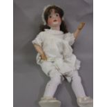 Heubach Koppelsdorf, German 30in bisque headed doll with fixed brown eyes,