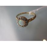 18ct Yellow gold opal and diamond flower head ring