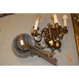 Set of three Dutch style brass wall lights,