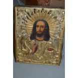 Small gilt metal mounted icon painted with a portrait of Christ
