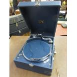 ' His Master's Voice ' portable gramophone covered in blue leatherette with handle and needles