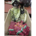 Two composition and fabric dolls with hand made clothing