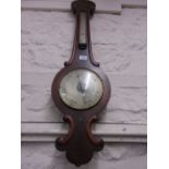 Victorian figured mahogany wheel barometer with silvered dials