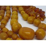 Butterscotch amber bead necklace together with a Baltic amber necklace CONDITION REPORT