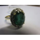 18ct Yellow gold oval emerald and diamond ring, the emerald 4.