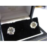 Pair of 18ct white gold diamond solitaire stud earrings, approximately 2.
