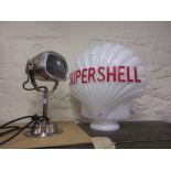 Reproduction ' Shell ' glass petrol pump globe together with a cast spotlight mounted as a table