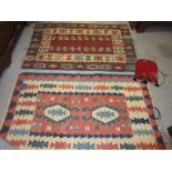 Two Kelim flat weave rugs together with Kelim bag