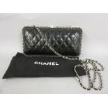 Ladies small Chanel black quilted handbag CONDITION REPORT The bag is in good