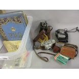 Agfa SLR camera with accessories, two further cameras, canvas bound volume ' The R.I.