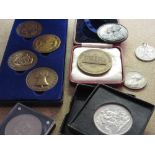 Bag containing a small quantity of various commemorative coins etc.