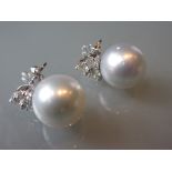 Pair of 18ct white gold South Sea pearl and diamond earrings, the diamonds, approximately 1.