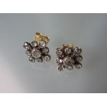 Pair of 18ct yellow gold nine stone diamond stud earrings