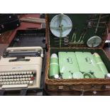 Wicker picnic hamper by Coracle together with a cased typewriter