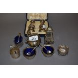 Cased pair of Birmingham silver peppers,