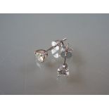 Pair of 18ct white gold screw back diamond stud earrings, approximately 0.