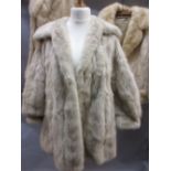 Two ladies light coloured fur coats by Hockley Furs and a similar stole