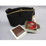 Ladies 20th Century black handbag with brass clasp together with a boxed Stratton compact decorated