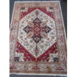 Beige ground Heriz pattern machine woven carpet, 2.30m x 1.