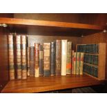 Miniature set of Charles Dickens volumes in miniature bookcase,