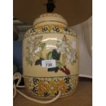 Cream ground and floral decorated table lamp in the form of a ginger jar with shade