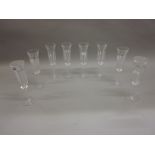 Set of eight Baccarat faceted glass champagne flutes (two at fault) CONDITION REPORT