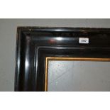 Rectangular swept gilt picture frame, aperture size 16ins x 21ins and another,