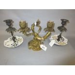 Pair of patinated metal and porcelain chamber candlesticks,