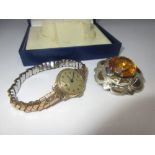 Ladies 9ct yellow gold cased Certina wristwatch with silvered dial and gold plated strap,