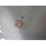 18ct White gold diamond pendant on a 9ct white gold chain