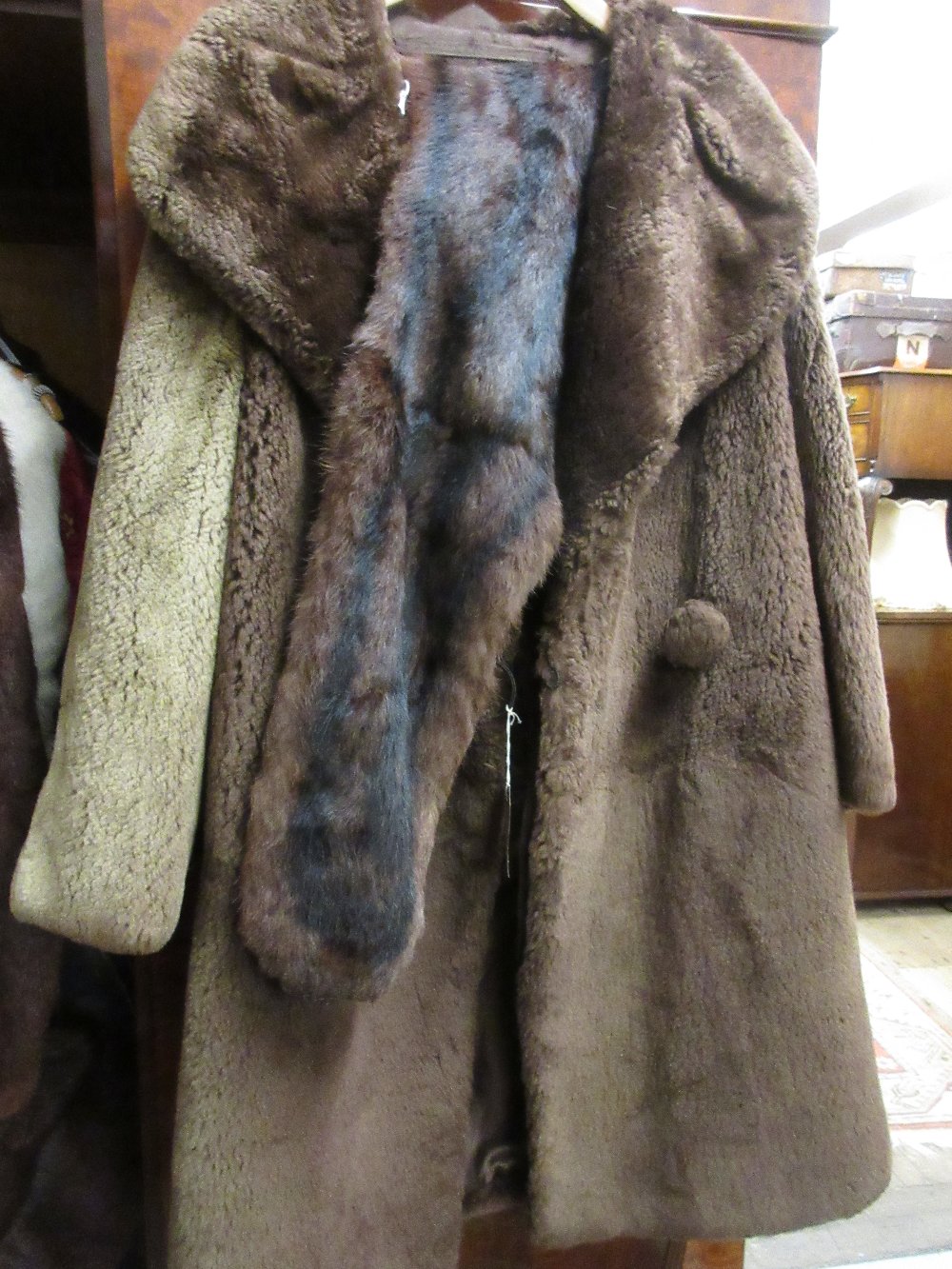 Synthetic fur coat and a fur stole