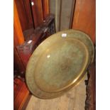 Chinese circular brass tray top table with carved folding stand