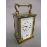 20th Century Mappin and Webb brass cased carriage clock having enamel dial with Roman numerals