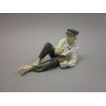 Royal Copenhagen figure of a reclining boy eating lunch CONDITION REPORT In good