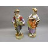 Pair of large late 19th Century Continental porcelain figures of a lady and gentleman decorated
