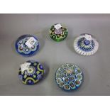 Group of five various glass paperweights, including: Perthshire,