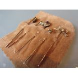 Group of five 9ct yellow gold stickpins