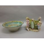 Late 19th or early 20th Century Continental porcelain basket form vase surrounded by various