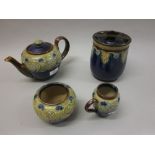 Royal Doulton stoneware three piece tea service decorated with an Art Nouveau design together with