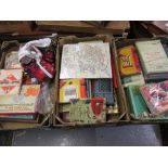 Three boxes containing a quantity of various boxed childrens games, puzzles etc.